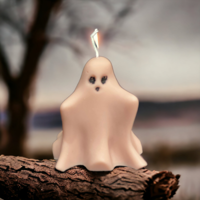 Handmade ghost candle with soft sculptural shape, decorative autumn candle