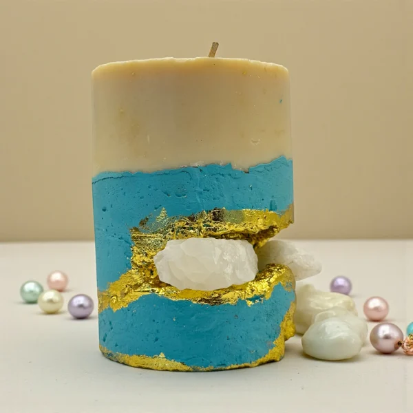 Ritual of Touch luxury handmade soy wax candle with black and ivory layers, gold leaf accents and a natural white aragonite crystal, elegant ritual décor. Title